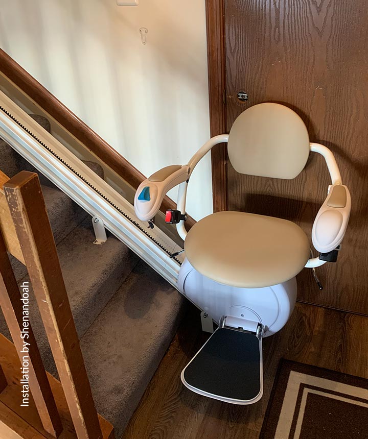 K2 stairlift for straight stairs shown with optional V seat