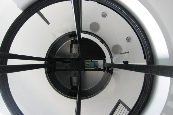 Upwards view of winding drum hoist mechanics